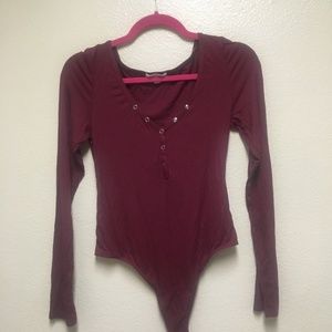 Long sleeved burgundy bodysuit